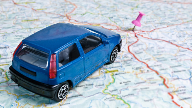 Road-trip-vacation--car-on-map-jpg